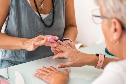 Professional manicure being applied