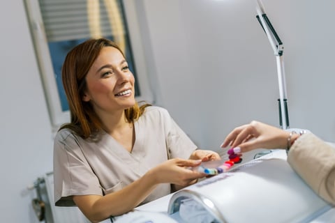 Client choosing nail color